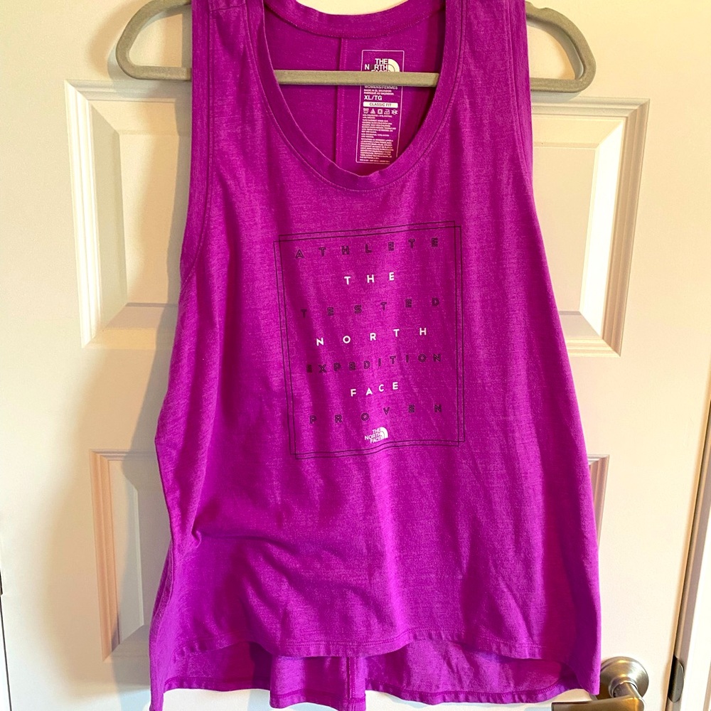 Purple north face tank top with saying on it
